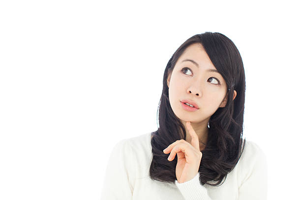 istock Japanese woman making gestures in white background 611175760
