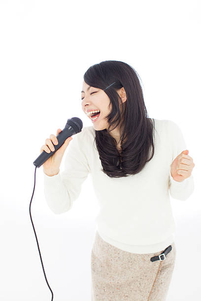 istock Japanese woman singing 611176344