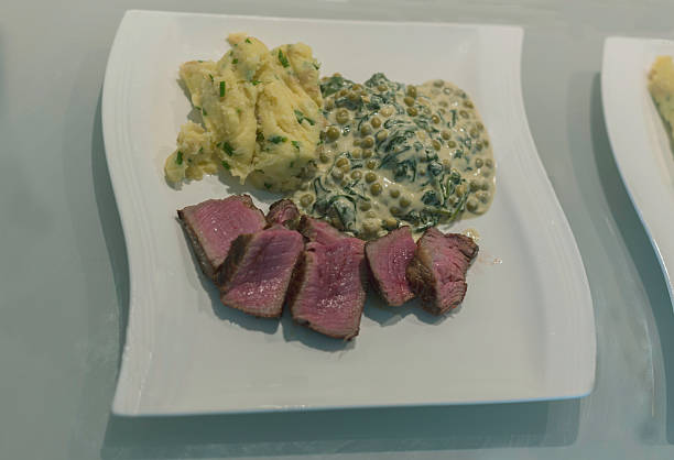 istock Fillet Steak diner with mash and creamed vegetables 611177240