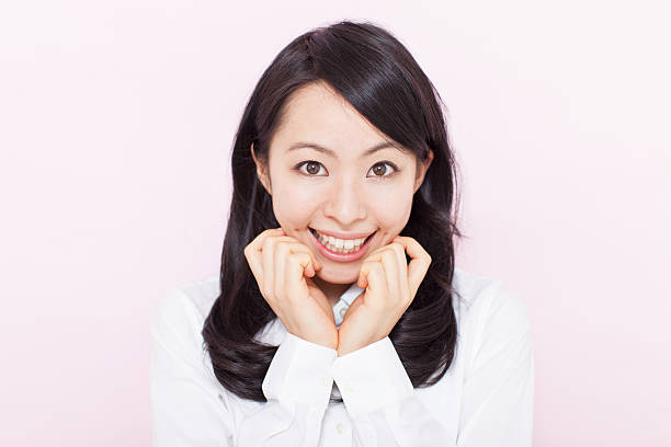 istock Japanese woman in pink background 611177380