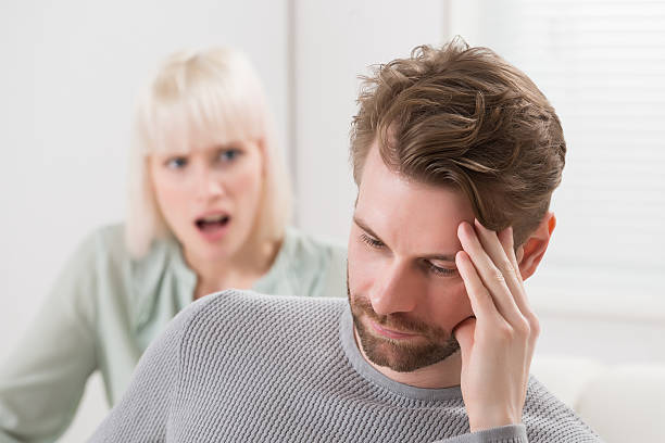 istock Woman Shouting To The Frustrated Man 611178682