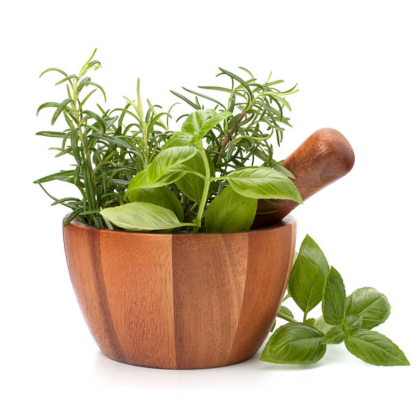 istock fresh flavoring herbs and spices in wooden mortar 611180318