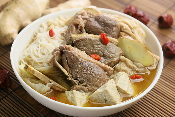 istock Ginger duck in chinese style in white pot on bamboo 611180908