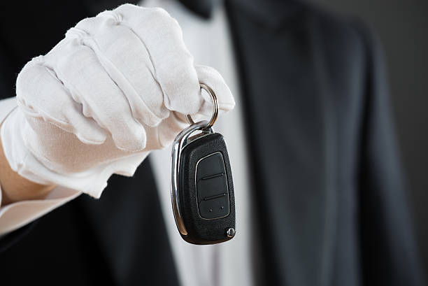 istock Waiter Holding Car Key 611181952