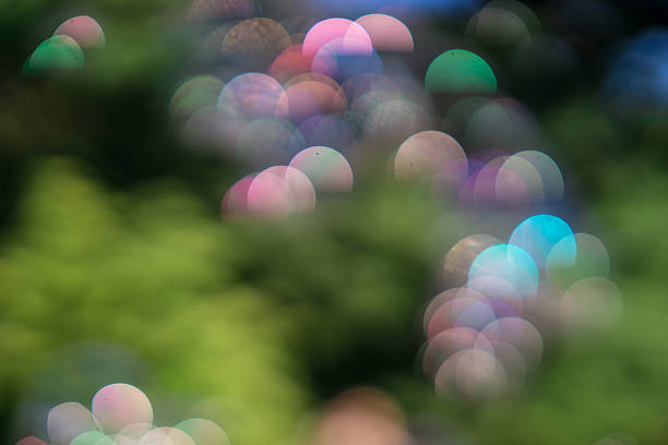 istock Giant rainbow soap bubbles floating in the summer air 611182456