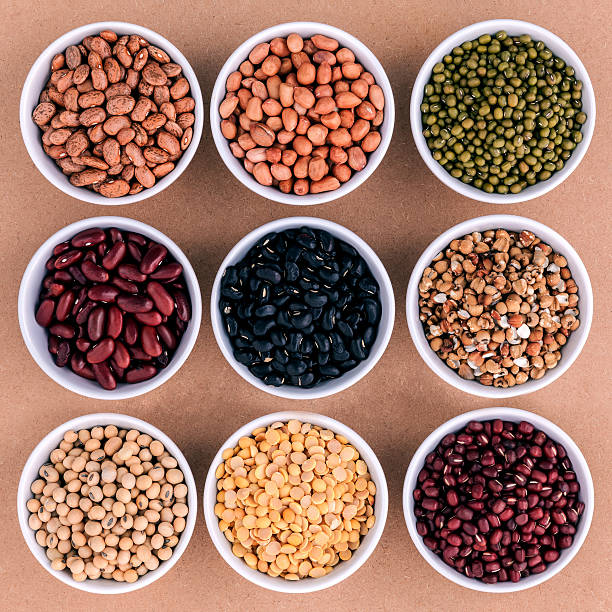 istock Mixed beans and lentils in the white bowl . 611183442