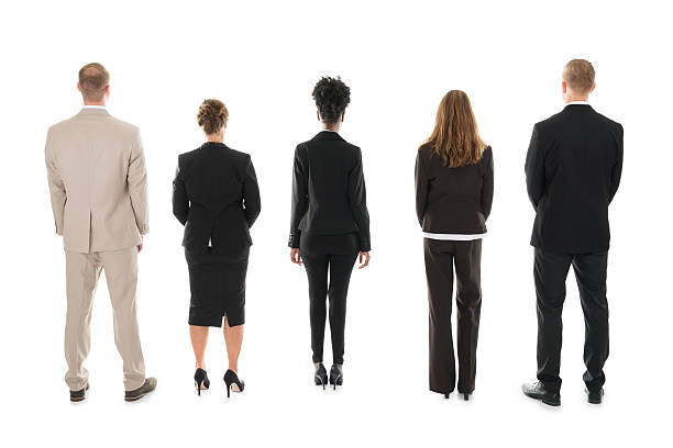 istock Business Team Standing Against White Background 611183634