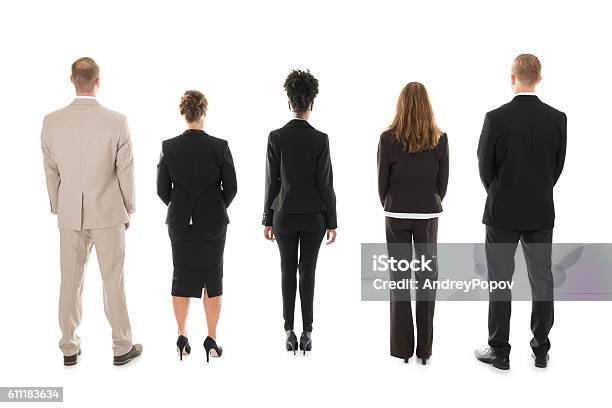 Business Team Standing Against White Background Stock Photo - Download Image Now - Rear View, Business Person, White Background