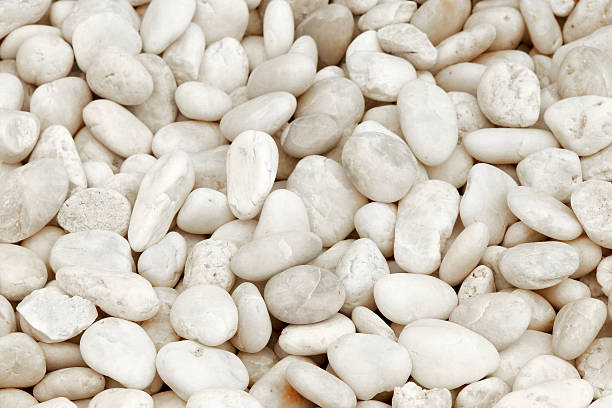 istock textured of white stone or rock background 611184476