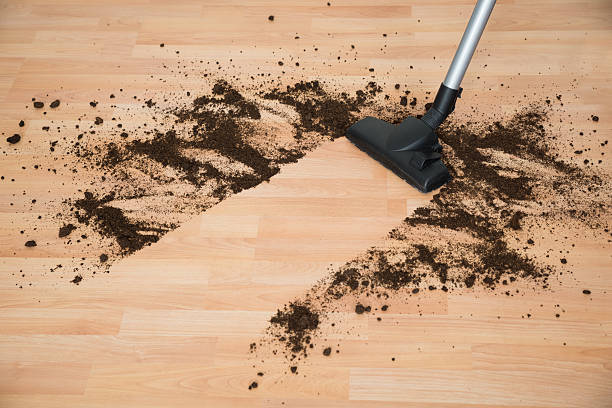 istock Vacuum Cleaning Hardwood Floor 611185384