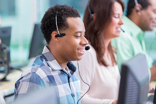 istock Cheerful African American IT support person in call center 611185426