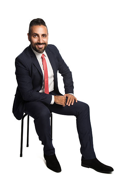 istock Sitting businessman smiling 611185482