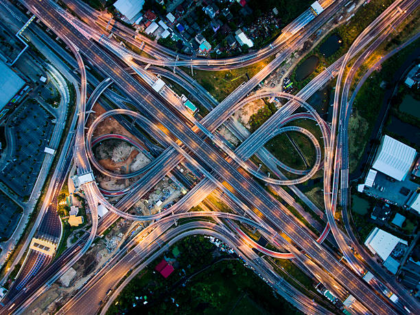 Highway junction from aerial view Highway junction in  Bangna, the east of Bangkok from aerial view in the night. Taken in August 2016. night freeway stock pictures, royalty-free photos & images