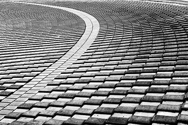istock part of the road with concrete blocks 611195138