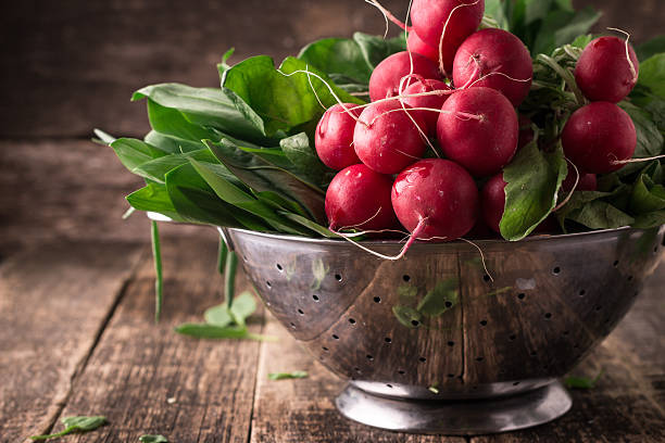 fresh vegetables in a metal colander ,healthy food fresh vegetables in a metal colander ,healthy food on a wooden vintage table radish stock pictures, royalty-free photos & images