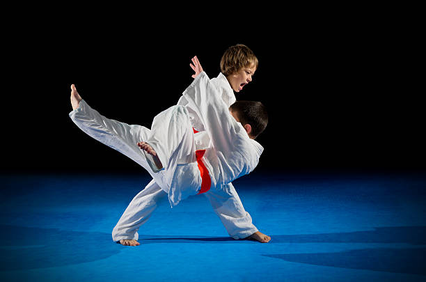 istock Children martial arts fighters 611199700