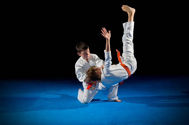 istock Children martial arts fighters 611199732