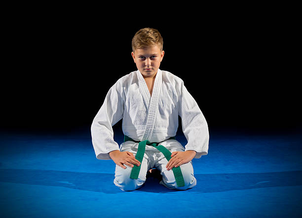 istock Boy martial arts fighter 611199884