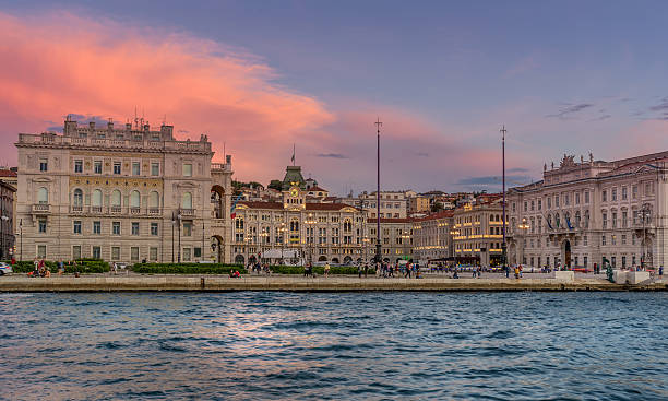 Piazza Dell Unita D'Italia in Trieste Piazza Dell Unita D'Italia is the largest square on the sea front in Europe trieste stock pictures, royalty-free photos & images