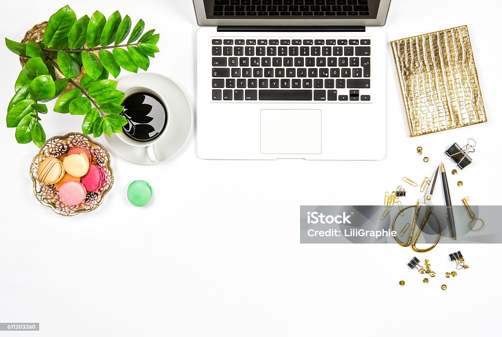 Office supplies and laptop. Business still life. Flat lay Office supplies and laptop. Business still life. Coffee and macaroon cookies. Flat lay Blogging Stock Photo