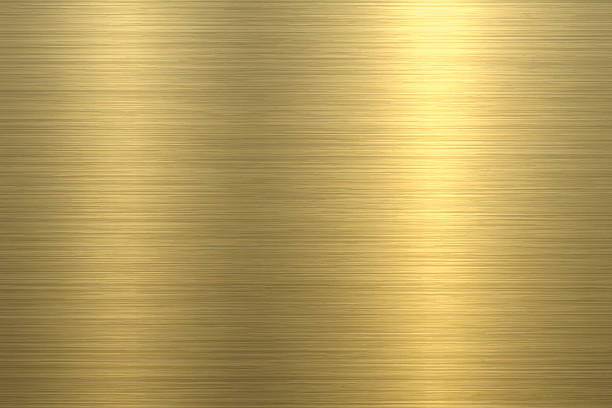 Gold Background - Metal Texture Gold shining metal texture background can be used for design. With space for text. brass stock illustrations