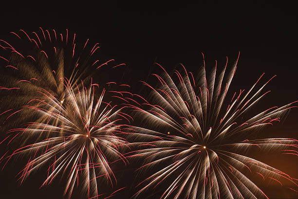 istock fireworks sparks smoke on a black background 611207170