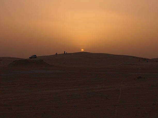 istock The sun sits down at the horizon 611208582