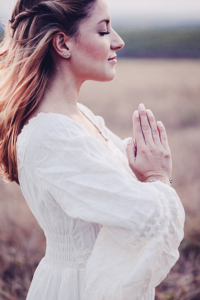 istock Beautiful woman in a meadow 611209030