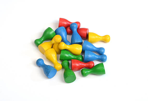 istock Colorful playing pawns on white background 611209124