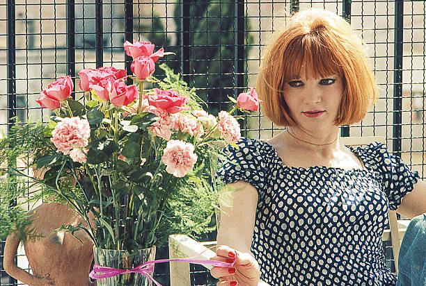 istock Beautiful woman with flowers 611209854
