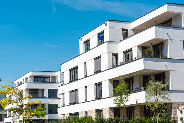 istock White modern townhouses in Germany 611212244