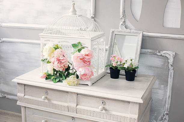 istock dresser with flowers in a light classical interior 611214032