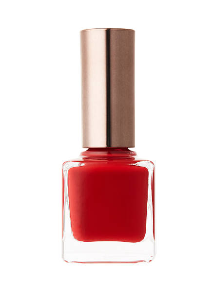 istock Red color nail polish in container 611290504