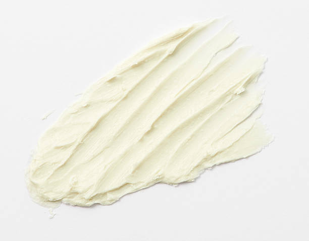 istock Light Yellow color cream stroke on background 611290544