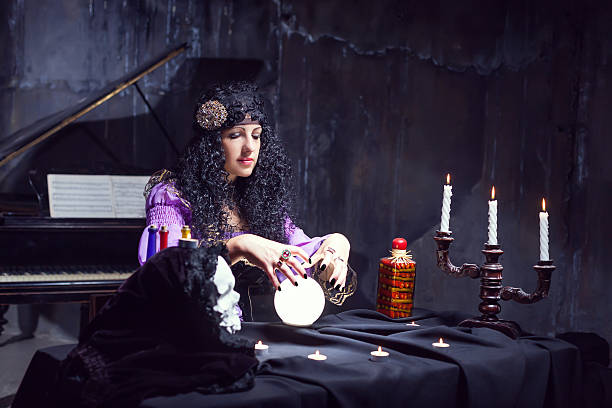 istock Sorceress in her room 611292504