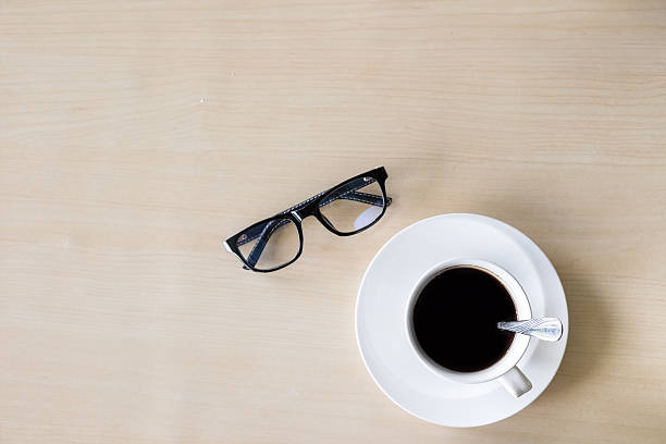 istock Black coffee cup on the wooden background. 611293168