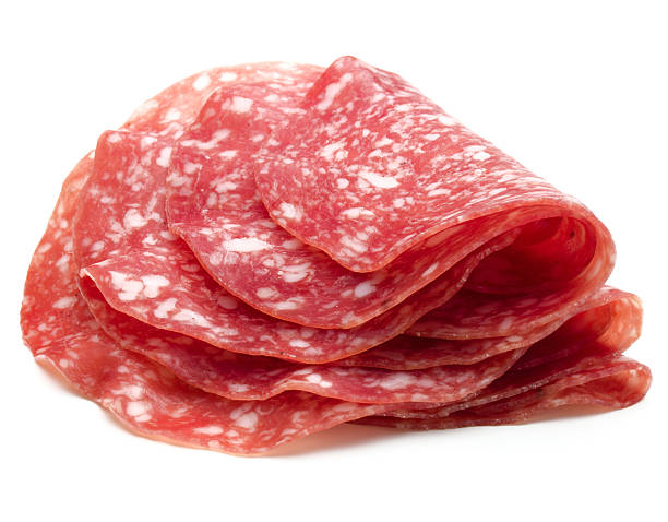 istock Salami sausage slices isolated on white background cutout 611293240