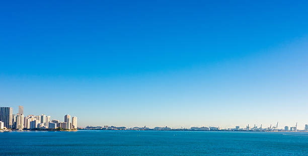 istock Miami Florida city skyline morning with blue sky 611293406