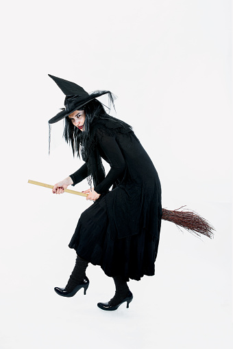 doll representing the Befana, a witch riding a broom