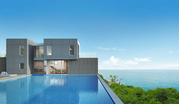 maison vue mer avec piscine dans un design moderne - looking at view water sea blue photos et images de collection