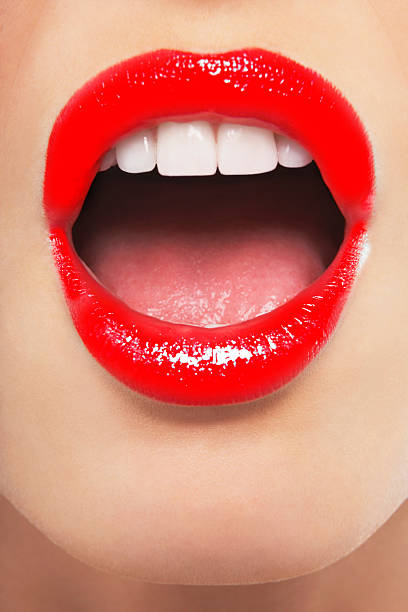 istock surprised woman with red lips 611295932