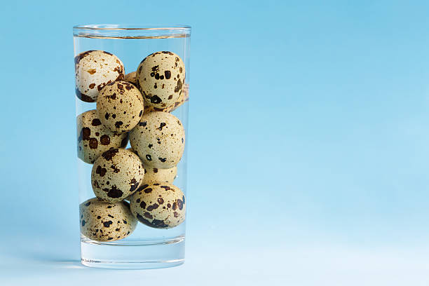 istock Quail eggs in a glass of with water 611296296