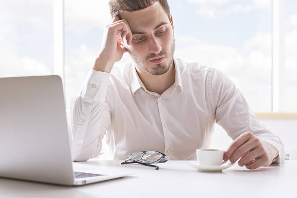 istock Thoughtful businessman portrait 611299208