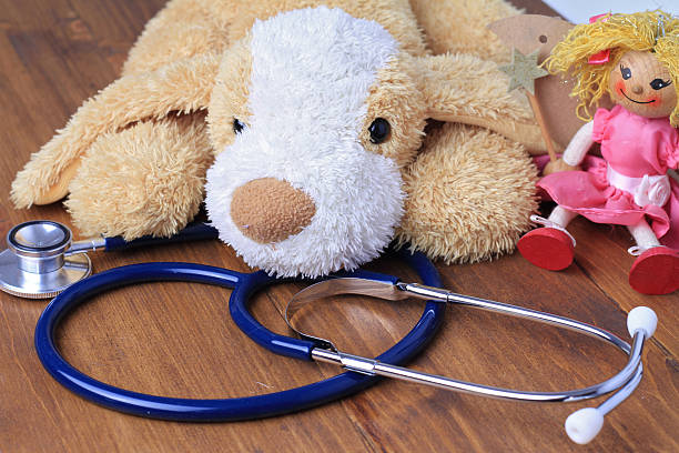 istock Pediatric care background, Toys and stethoscope 611299338