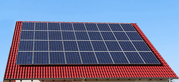 istock Roof with solar panels 611300498