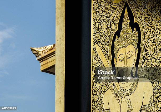 Wat Traimit Golden Engravement With Blue Sky Background Stock Photo - Download Image Now