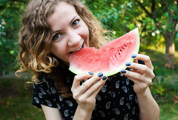 istock Cheerful Girl with Watermelon 611303848