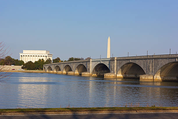 istock Memorial Bridge and US capital landmarks across Potomac River. 611304718