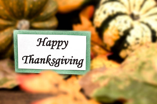 istock Happy Thanksgiving!  Autumn centerpiece with pumpkin, leaf decorations. 611304972