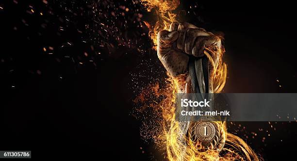 Sport Winner In A Competition Fire And Energy Stock Photo - Download Image Now - Winning, Sport, Success